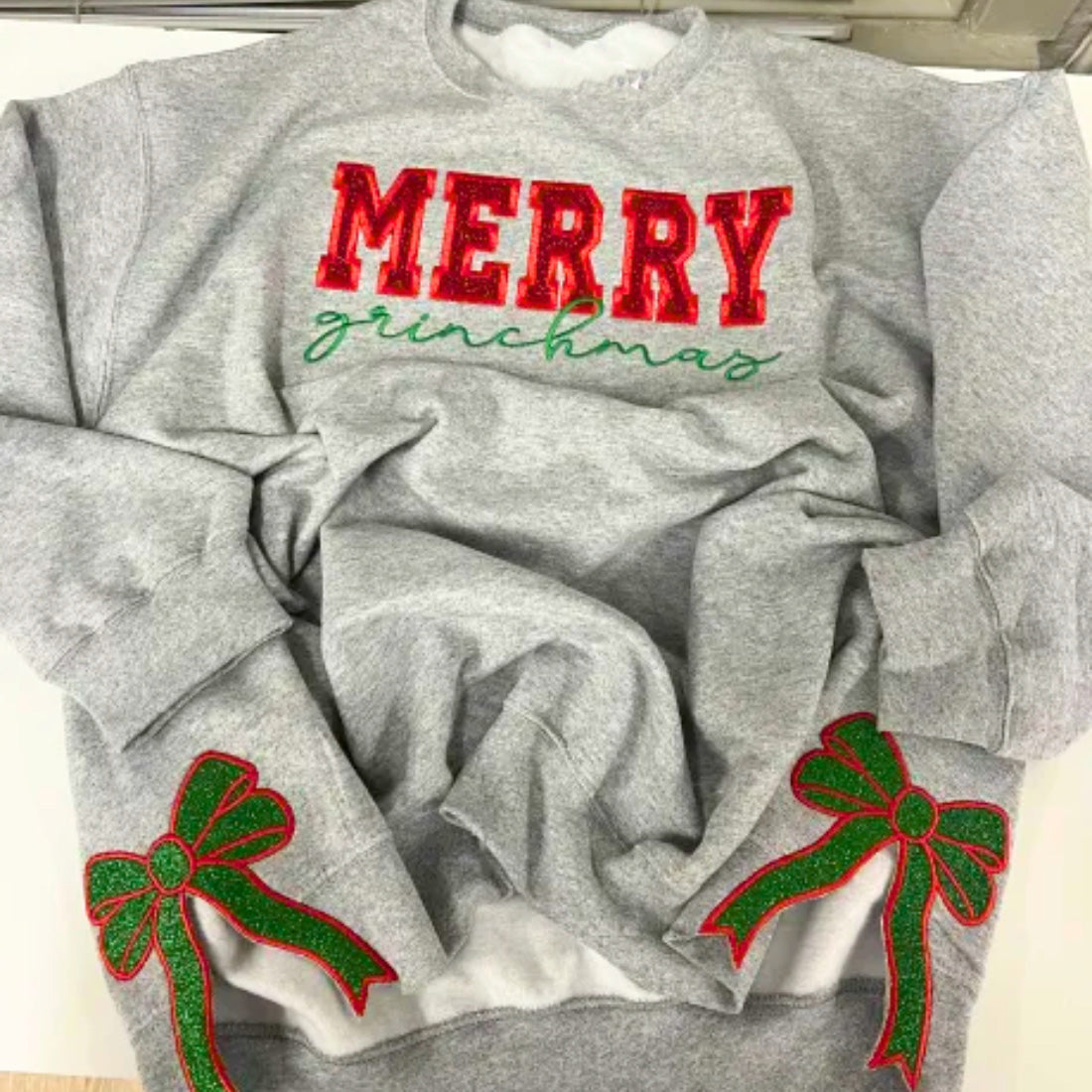 Merry Grinchmas Side Bow Sweatshirt